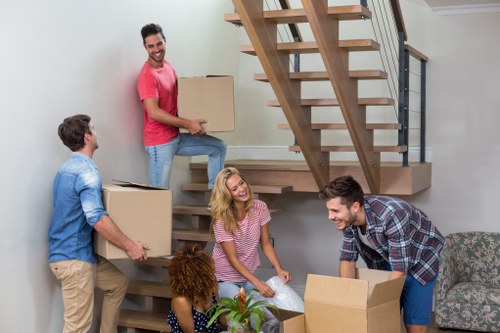 Packed boxes and furniture ready for removal services in Charlton