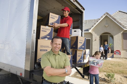 Careful packing of household belongings for relocation in Charlton