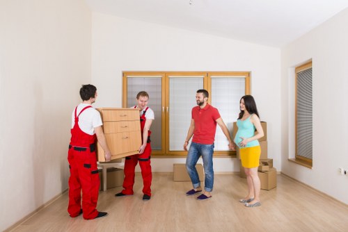 Professional house removalists preparing furniture for a Charlton home move