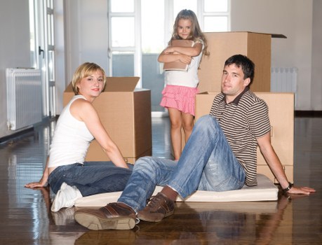 Professional man and van moving items through Charlton area